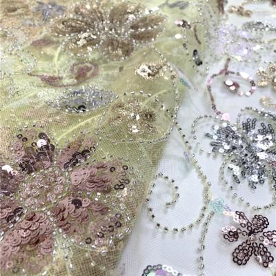 China 2021 elastic lace fabric sequin beaded african lace fabrics with luxury beads for textile for sale