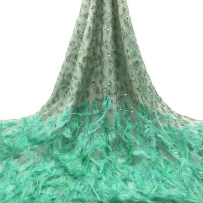 China Elastic Feather 3d Feather Lace Fabric Wedding Organic Sequin Design Net Tulle Lacquer for sale