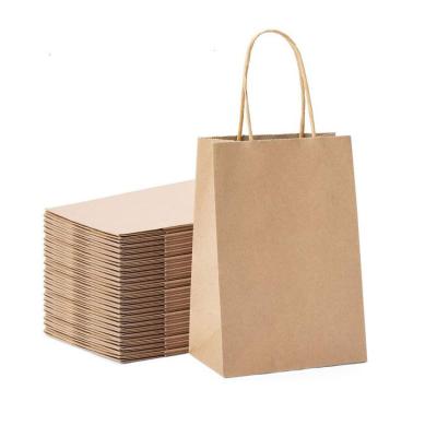 China Custom Recycled Materials Logo Brown Craft Packaging Gift Recycle Bag Kraft Paper Shopping Bags With Handles for sale