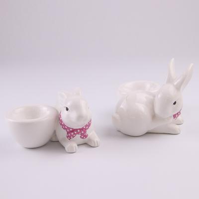 China Europe White Porcelain Ceramic Rabbits Figurines With Easter Egg Holder for sale