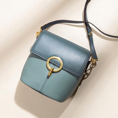 China Fashion 2111 Spring New 2021 Cute Bucket Bag Korean Style Fashion Cross One-shoulder Bag Genuine Leather Wide Band Women - Body Bag for sale