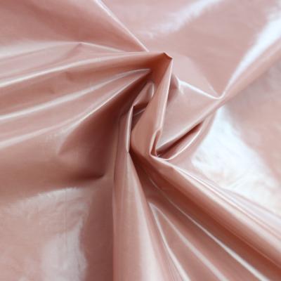 China Waterproof Nylon Taffeta Fabric With PU Coating Waterproof Glossy Fabric For Garments for sale