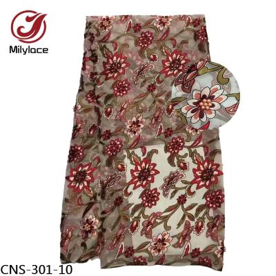 China Italian plain soft texture soft romantic clothing fabric floral printed stoned silk fabric with beads for sale