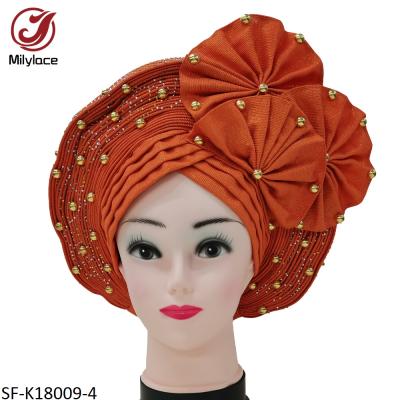 China Beautiful Accessories Soft Wedding Turban With Beads Stones Plain Pleated African Ladies Headwrap Party Hat for sale