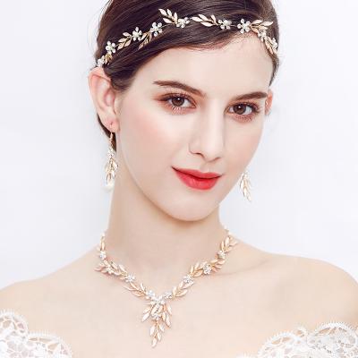 China Simple luxury bridal elegant soft pearl rhinestone leaf alloy ladies hair band headdress bridal party for sale