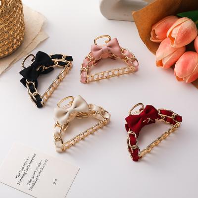 China High quality ! The new soft claw cuts 2021 fashion stylish cute large cavity metal geometric shark bow hair claw for sale