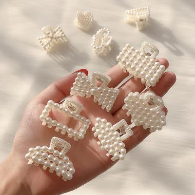 China Sweet Customized French Retro Small Pearl Clip Female Bangs Hair Claw Clips for sale