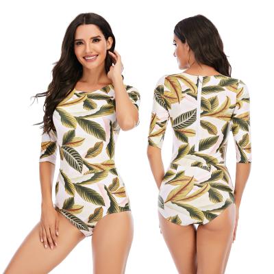 China 2021 Antibacterial Leaves Print Swimwear One Piece Swimwear Women Back Zippered Surfing Wetsuits Diving Suits Long Sleeve for sale