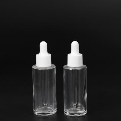 China 50ml Boston Round Essential Oil Bottles Glass Cosmetic Custom Frosted Dropper Bottle for sale