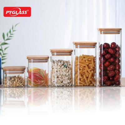 China Sustainable Glass Kitchen Canisters With Airtight Bamboo Lids , Glass Storage Jars For Kitchen for sale