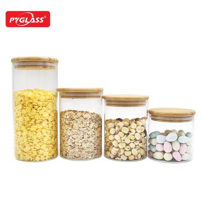 China New Trend Sustainable Large Glass Food Storage Jar With Airtight Wooden Lid, Glass Storage Canisters Container for sale