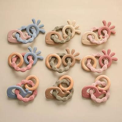 China New Healthy Food Grade Eco-friendly Soft Teether Ring Silicone Baby Teether Toys for sale