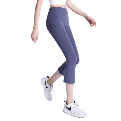 China WUAI 2021 Wholesale Seamless Hip Yoga Pants Breathable Sports Running Fitness Yoga Pants For Women Fitness And Yoga Wear for sale