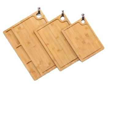 China Disposable Bamboo Meat Steak Carving Board Bamboo Cutting Board With Groove for sale