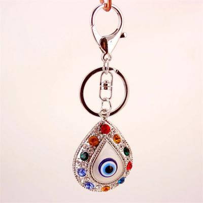 China Fashion Color Rhinestone Eye Key Chain Women Bag Accessories Keys Chain Water Drop Alloy Pendant Key Buckle for sale