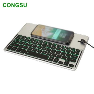 China Wireless Slim Tablet Blue Tooth BT Keyboard With Qi Wireless Charger Charging Pad for sale