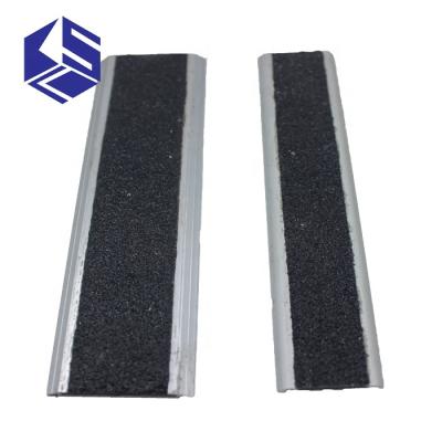 China Eco - Friendly Black Carborundum Flat Floor Transition Strip For Door Bar for sale