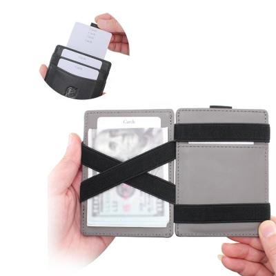 China Handmade maker rfid credit card holder genuine leather rfid blocking bifold elastic magic wallet for sale