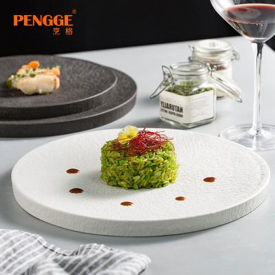 China Sustainable Creative European-style hotel restaurant steak flat plate light luxury plating special ceramic plate can be customized for sale