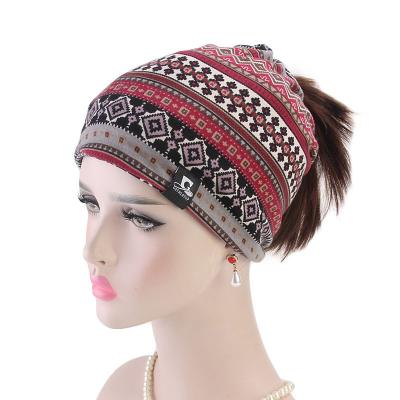 China New Comfy Women's Cotton Print Beanie Sleep Chemo Cap Ponytail Loose Slouchy Women Turban Ponytail Hat Headbands for sale