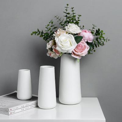 China (1300 degrees) modern white ceramic handmade vase high temperature fired flower vases for wedding for sale