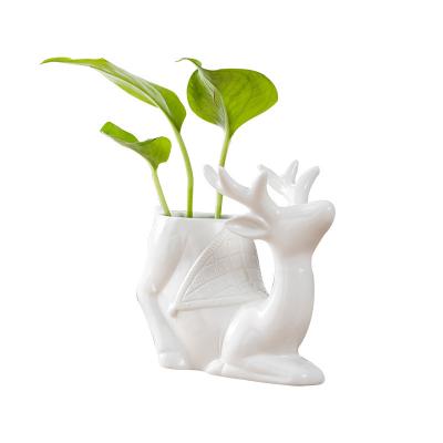 China Cheap Modern Cute Decorative Ceramic Animal Deer Shaped Small Flower Plant Pots Made In China for sale