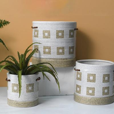 China Modern Classic Round Ceramic Flower Planter Pots Garden Sandy Soil Planter Pots With Braided Rope for sale