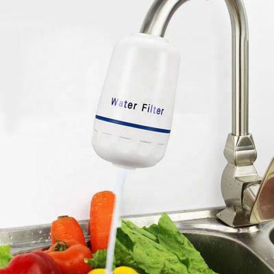 China Household Kitchen Mini Ceramic Water Purifier Small Water Filter Directly Connected With Tap Water Filter for sale