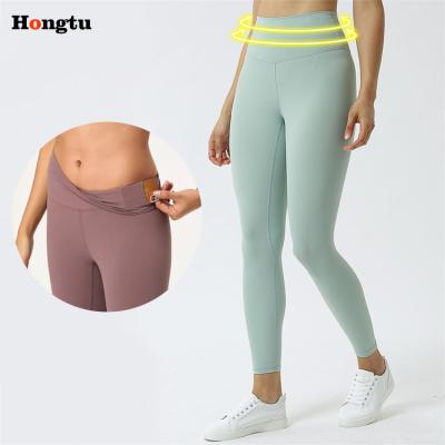 China High Waisted Sports Yoga Pants New Breathable Fitness Gaiters Clothing Ladies Women Gym Gaiters With Pockets for sale