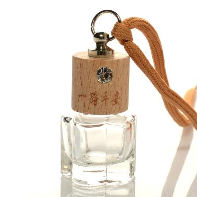 China Square Pendant Wooden Cap Round Ball Air Duct Logo Air Duct Cosmetic Empty Car Perfume Diffuser Hanging Glass Bottle for sale