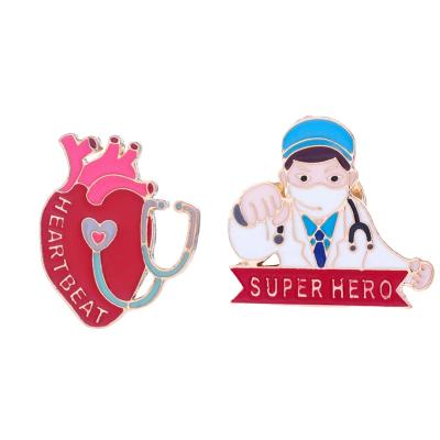 China Fashion Europe and the United States border hot jewelry cartoon doctors and nurses creative heart stethoscope brooch for sale