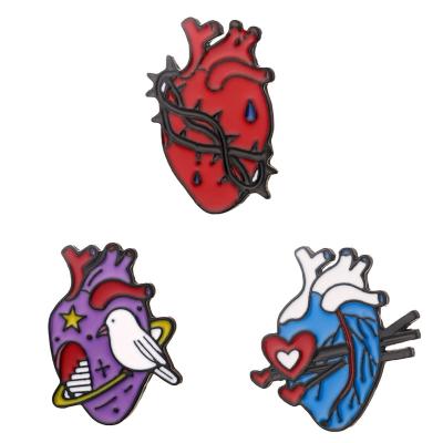 China New cartoon fashion series creative heart-shaped badge European and American nervous system heart brooch drop oil alloy decorative buckle for sale