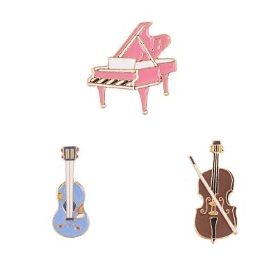 China New fashion foreign trade cartoon music series alloy brooch guitar electronic organ shape exquisite badge for sale