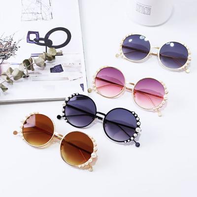 China Fashion Sunglasses 2020 Little Cute Girls Round Sun Glass Kid Girls Shape Pearl Sun Glasses For Children for sale