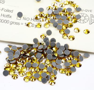 China Wholesale Topaz Color Loose Rhinestones Flatback Hot Fix Glass Rhinestone Eco-friendly For Clothing for sale