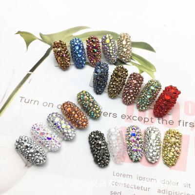 China Yantuo red light siam ab six eco-friendly in white flat back rhinestone round shape mix size non hot fix rhinestone for teeth for sale