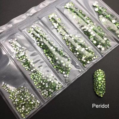 China Yantuo Doris Non Hotfix Light Green Blingbling Eco-Friendly Peridot Mixed Size Glass Rhinestones Siam ab Strass For Nail Art for sale