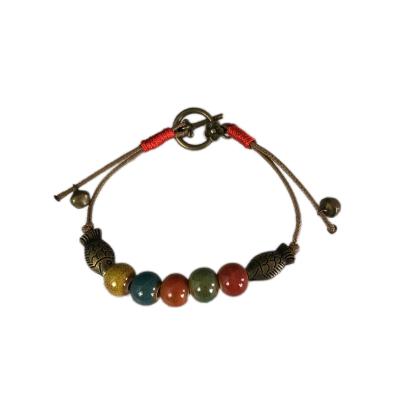 China Vintage Fashion Attractive Reactive Glazed Multiple Colored Ceramic Beaded Bracelet With Smart Wheel Lock for sale