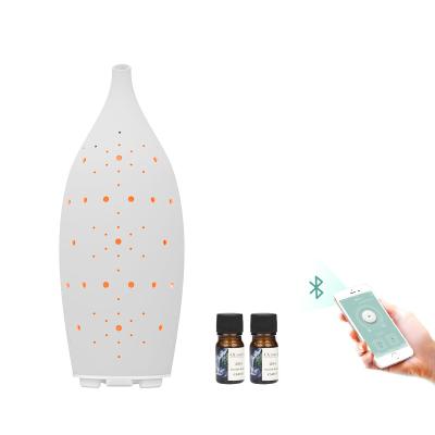 China New 7 Colors Aromatherapy Ceramic Electric Scent Air Machine Bluetooth Aroma Essential Oil Diffuser for sale