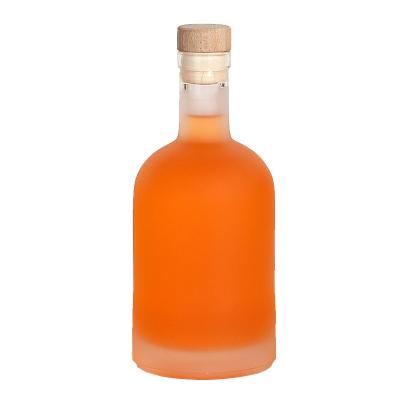 China 200ml 375ml 500ml 750ml 1000ml High Quality Customizable Viable Flint Glass Empty Transparent Round Bottle With Sealed Cork Lid for sale