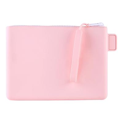 China Modern Manufacturer Customized Solid Color Silicone Wash Bag Cosmetic Multifunctional Foldable Stationery Storage Cell Phone Key Bag for sale