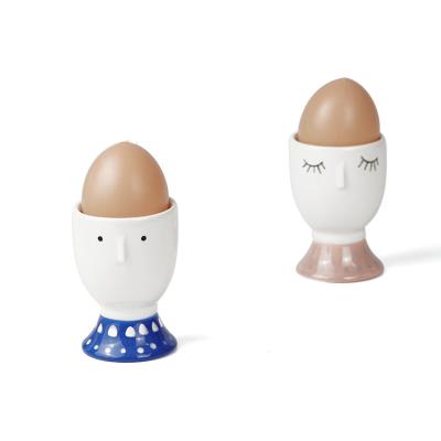 China Europe Hand Painted Cute Face Ceramic Egg Holder for sale