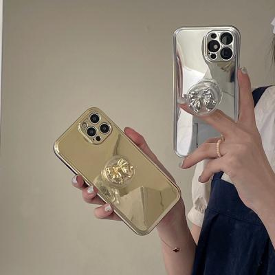 China new style Anti-fall plating plated gold imd square tpu phone case for iPhone12 phone cover with hand holder for sale