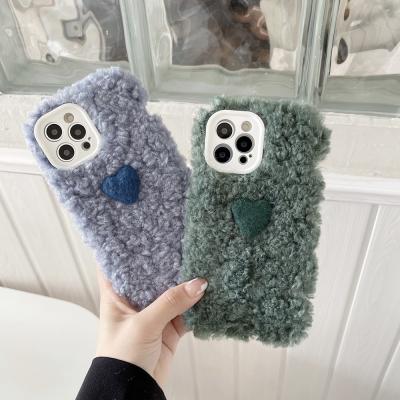 China Anti-fall winter heart warm fur plush phone cases for iphone 13 pro 7 8 11 12 xs pro xs xr furry hair shockproof cute back covers for sale