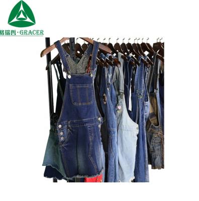 China Bundle second-hand clothing in ball girl and womenswear jeans skirt denim strap dress for sale