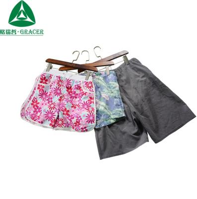 China Bundle Lot Occasion Clothes Used Sport Shorts Pants Wholesale Women Used Clothes for sale