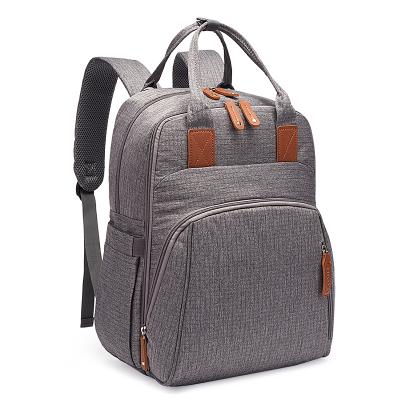 China 100% Waterproof New Baby Diaper Bags Eco-friendly Solid Wet Diaper Bag With Changing Station Diaper Backpack for sale