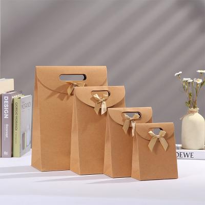 China Custom Luxury Shopping Paper Bag Recycled Kraft Logo Handle Paper Bag Print Die Cut Materials Packaging Small Gift Bags for sale