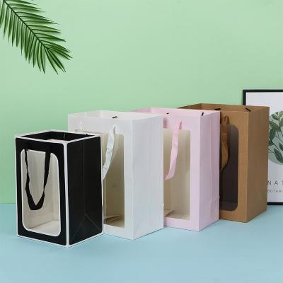 China Recycled Materials Wholesale Gift Luxury Paper Bag With Window And Handle Customization Clear Transparent Paper Bags for sale