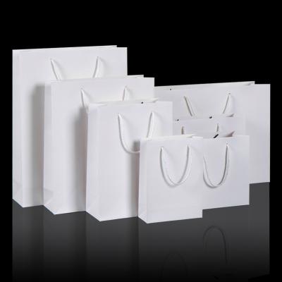 China Luxury Recycled Materials Jewelry Shopping Paper Bag With Bow Logo Custom Paper Shopping Bags For Clothes / Apparel for sale